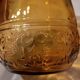 Italian pitcher service and 6 amber glasses