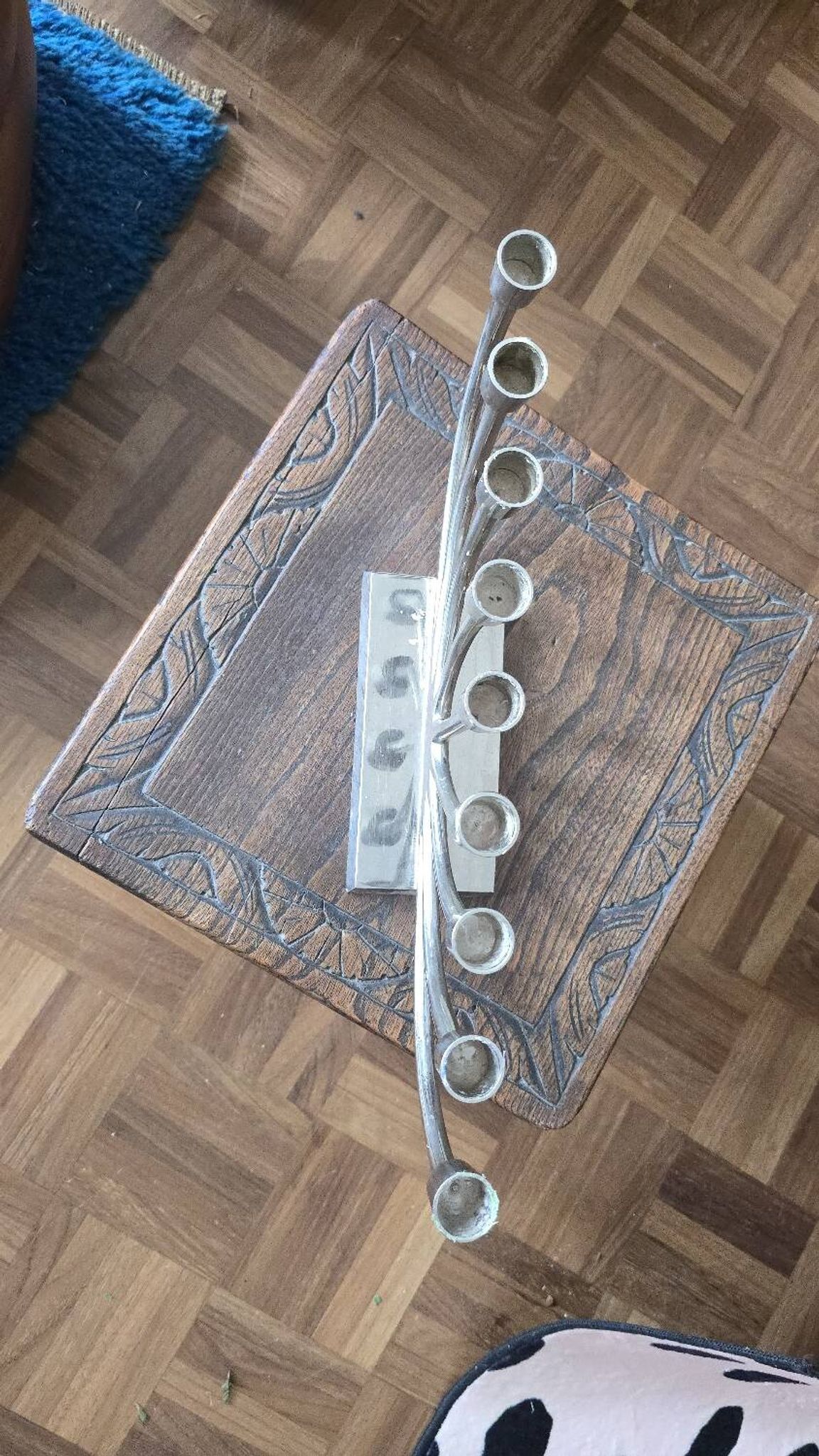 Large modern chrome metal candlestick for Hanukkah.