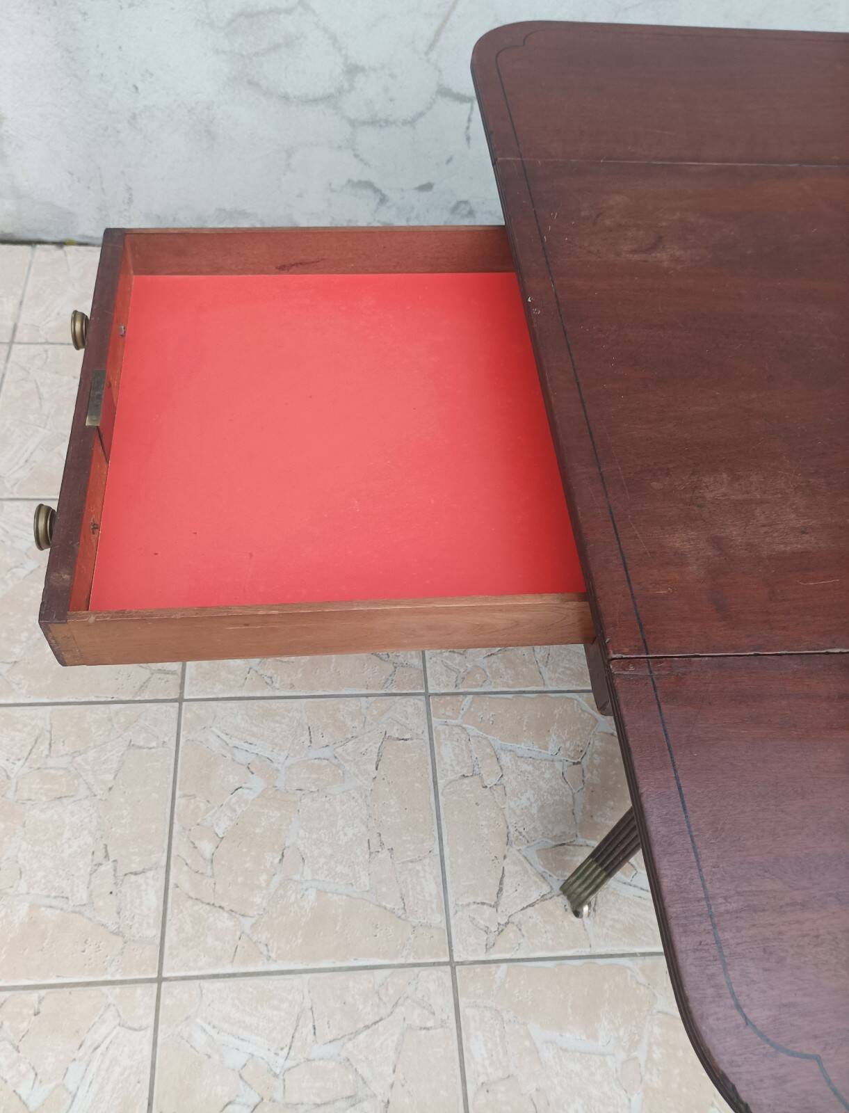 19th-century English style mahogany drop-leaf table.
