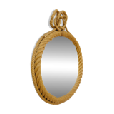 Large oval mirror in rope with pediment, 64cm x 56.5cm.