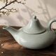 Celadon speckled glazed ceramic teapot