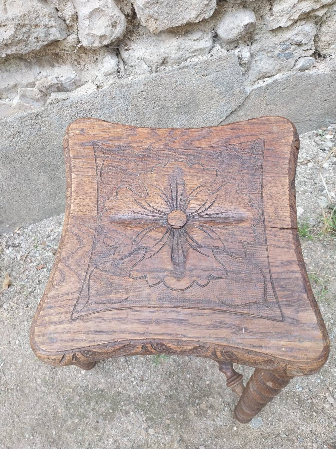 Wooden stool with turned legs