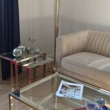 Vintage coffee table with glass, mirror, and brass.