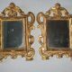 Pair of gilded wooden mirrors with cherub decoration 27x35cm