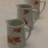 1 set of 3 porcelain pitchers