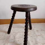 Brutalist tripod stool with twisted legs