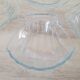 8 small shell-shaped ramekins in transparent glass