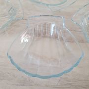 8 small shell-shaped ramekins in transparent glass
