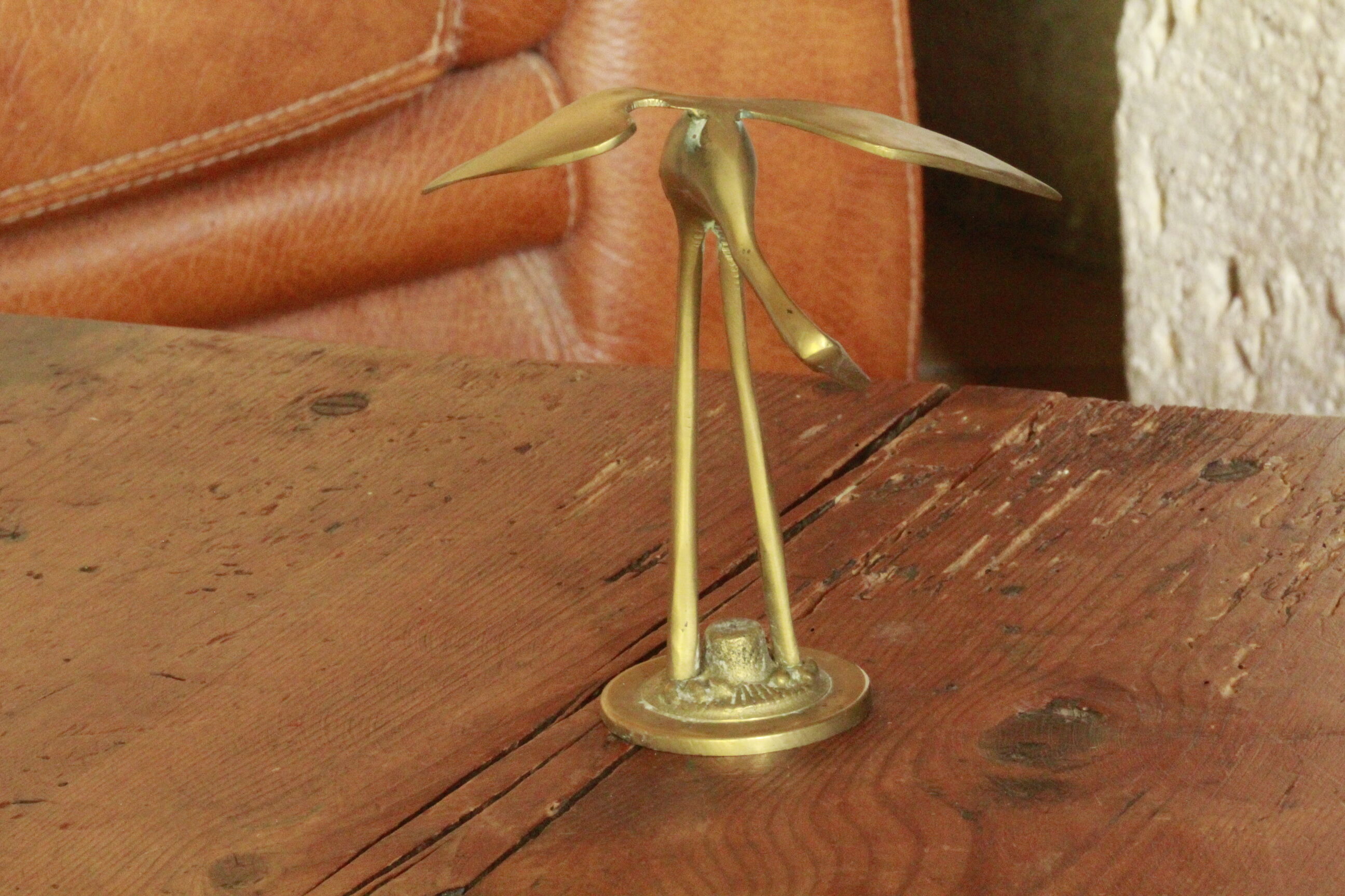 Brass heron statue