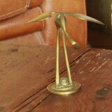 Brass heron statue