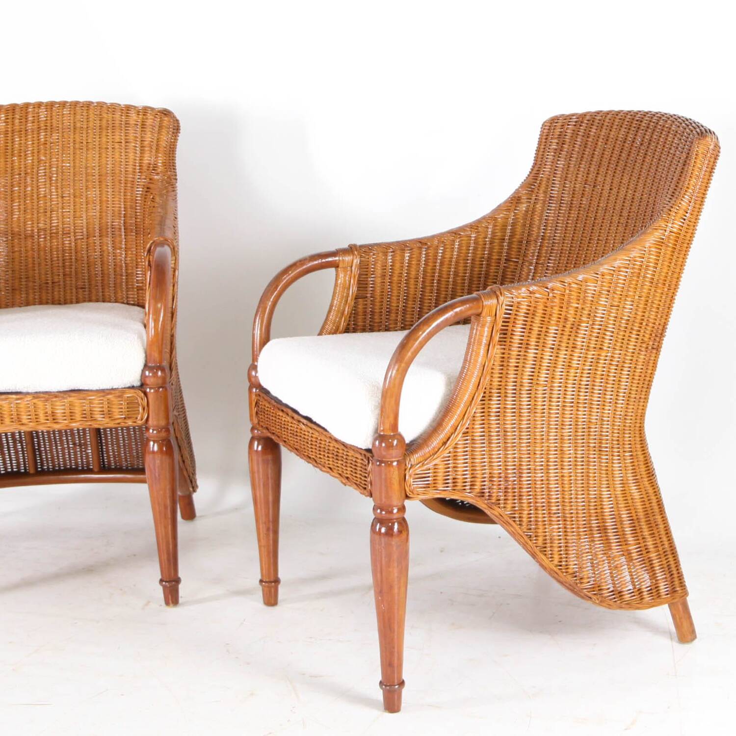 Pair of wooden and wicker armchairs