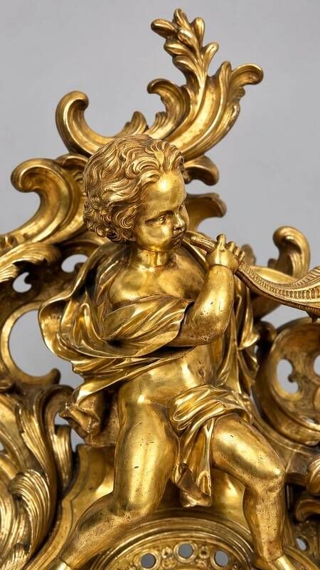 Pair of gilded bronze fire dogs Louis XV, musician putti