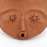 Round ceramic wall mask inspired by Africa, 1980s.