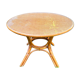 Canned rattan dining table and vintage glass