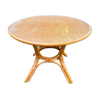 Canned rattan dining table and vintage glass