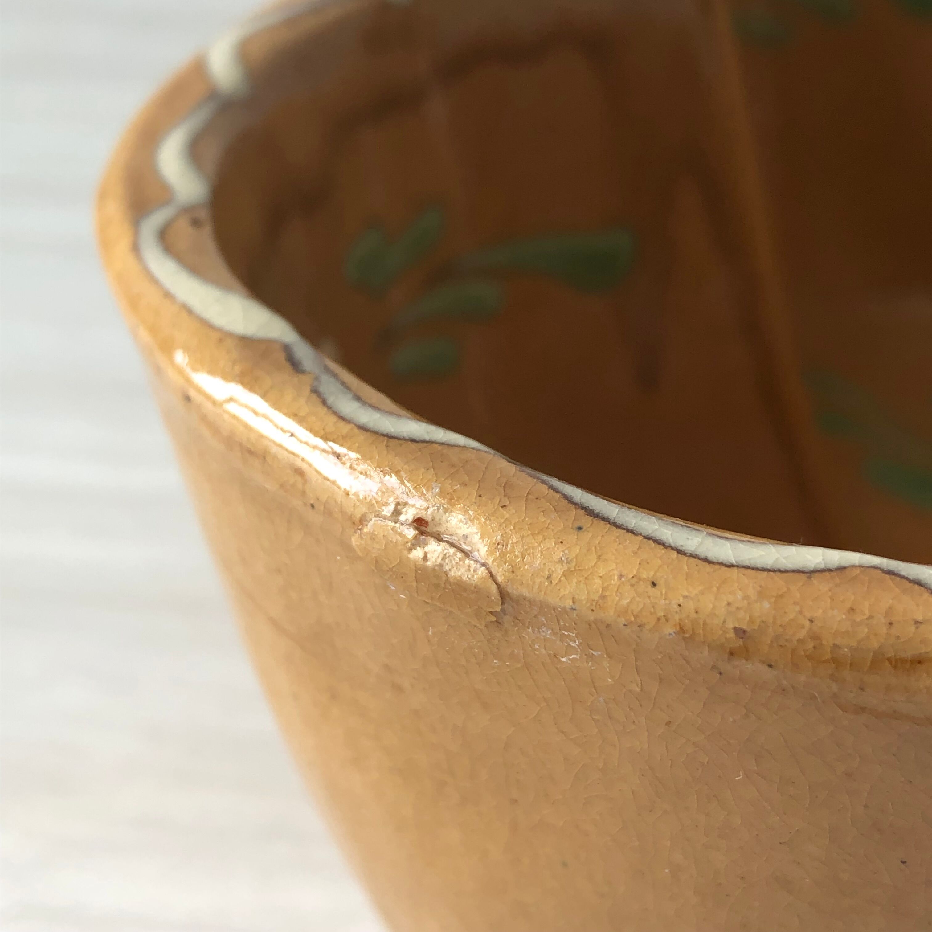 Alsatian decorative dish "heart" with floral motif in glazed terracotta