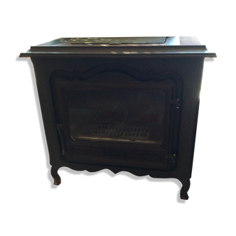 Signed cast iron wood stove