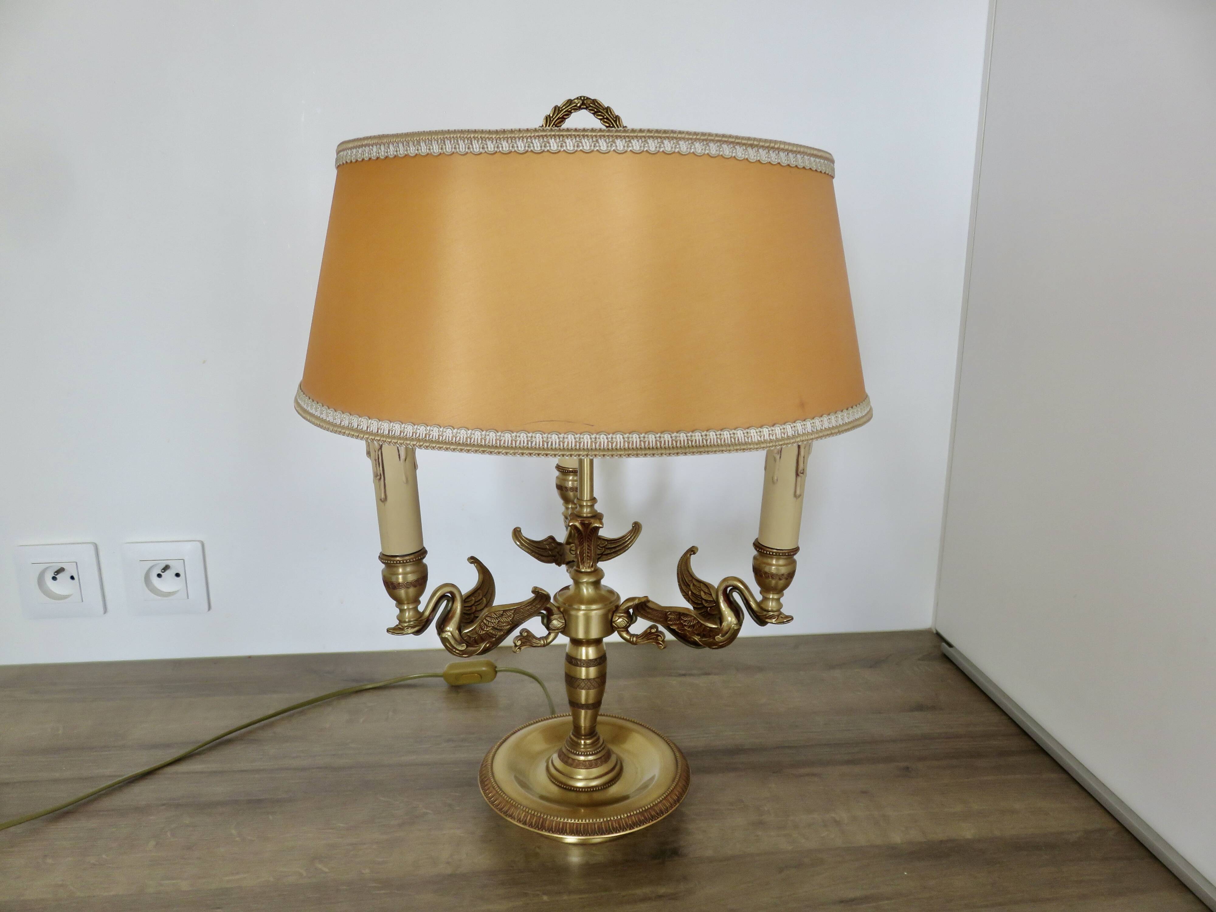 Lucien Gau empire style lamp in solid bronze gilded with bright gold "with swans"