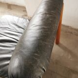 Pair of designer leather armchairs 80s