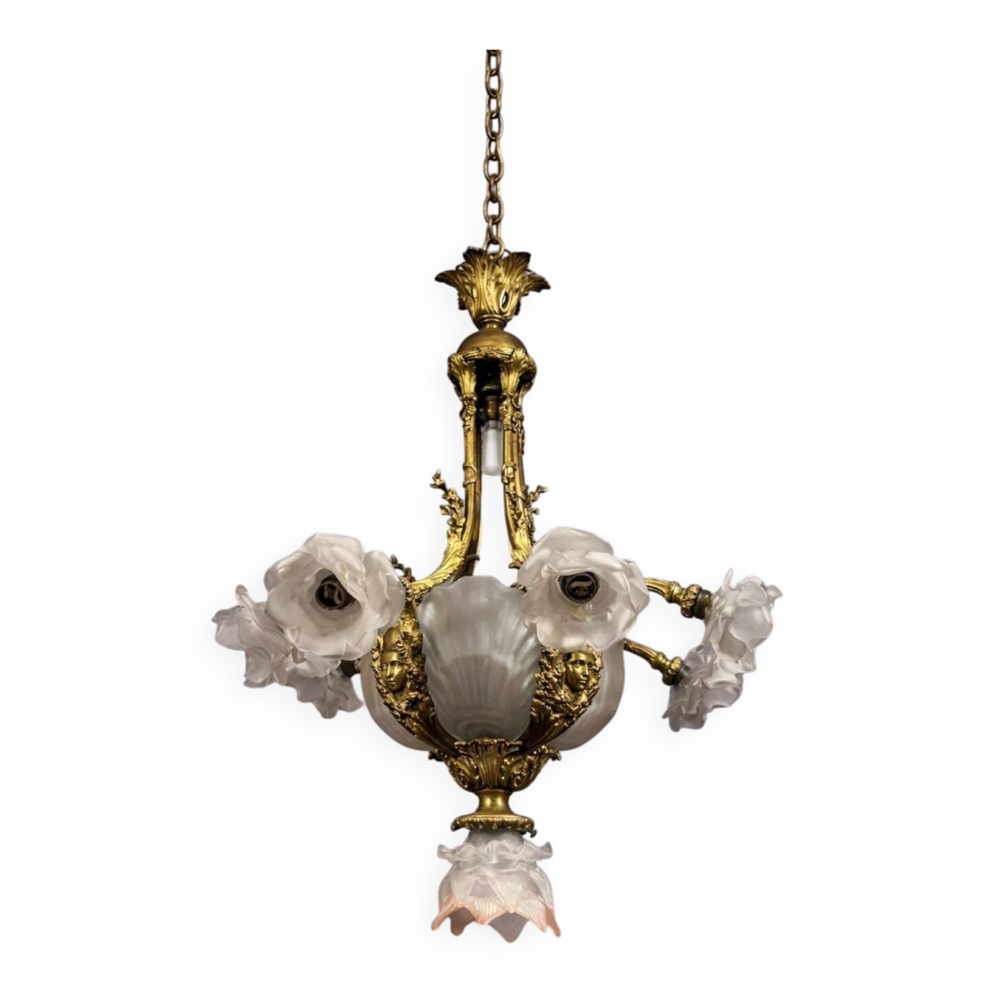 Rare and important gilded bronze chandelier with shells and roses.