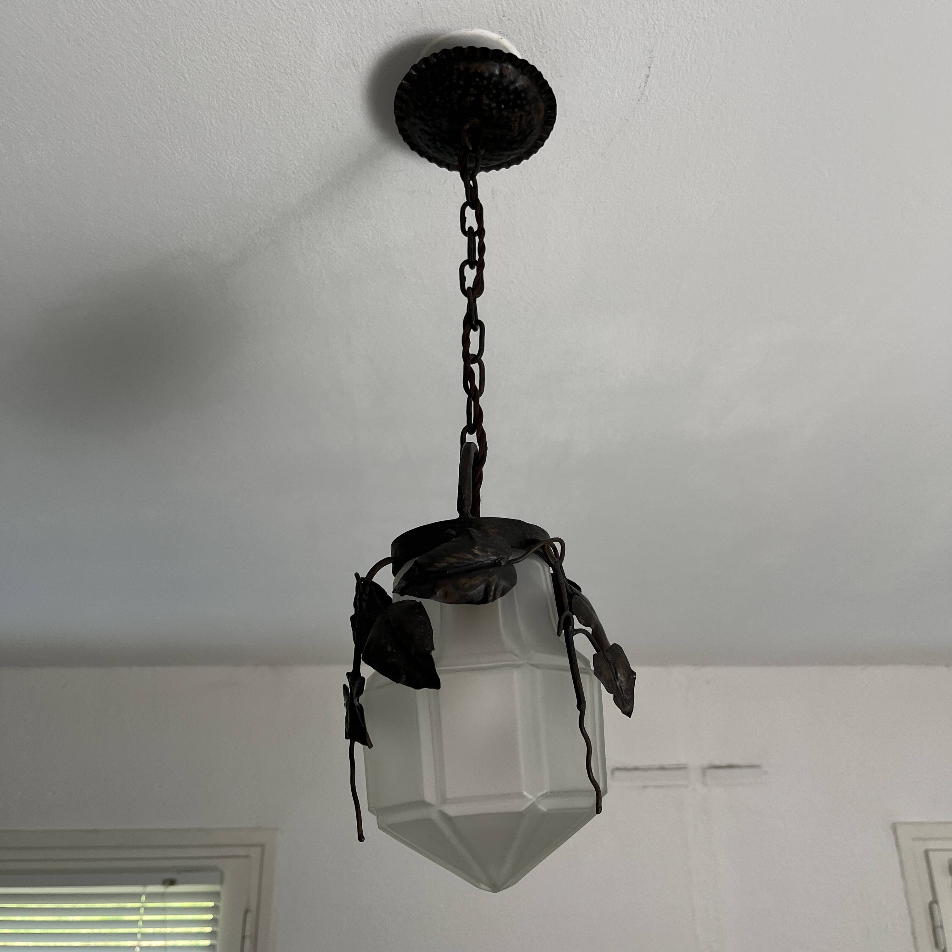 Antique glass and wrought iron pendant light with ivy decor Art Deco chandelier globe