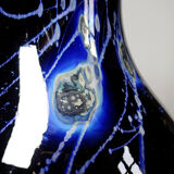 Large vintage purple art glass vase with silver glitter inclusions.