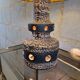 Ceramic lamp with openwork design and double lighting