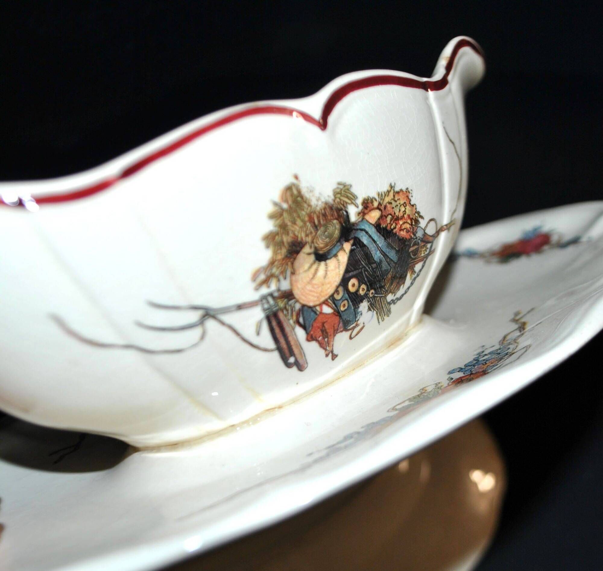 Sarreguemines sauce boat and dish in earthenware with "Obernai" decoration by Henri Loux