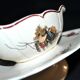 Sarreguemines sauce boat and dish in earthenware with "Obernai" decoration by Henri Loux