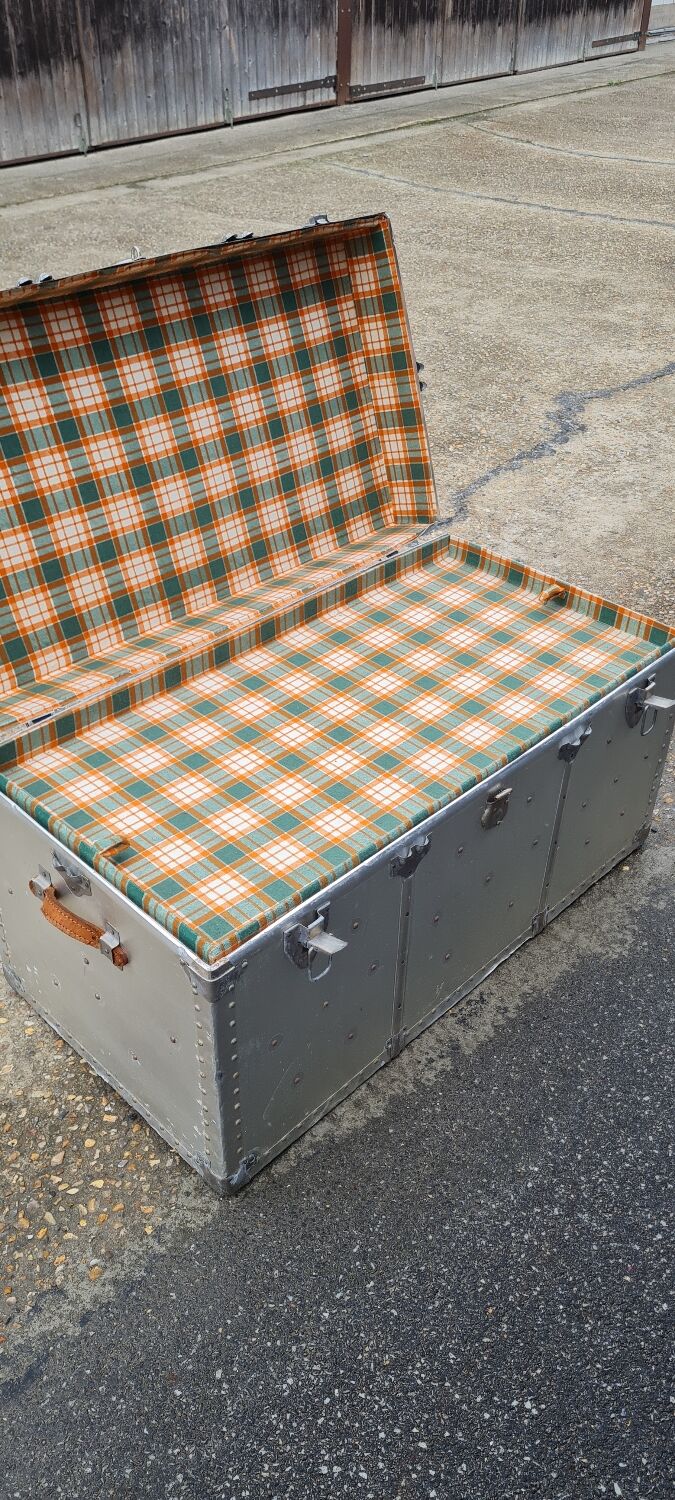 Riveted metal transport trunk