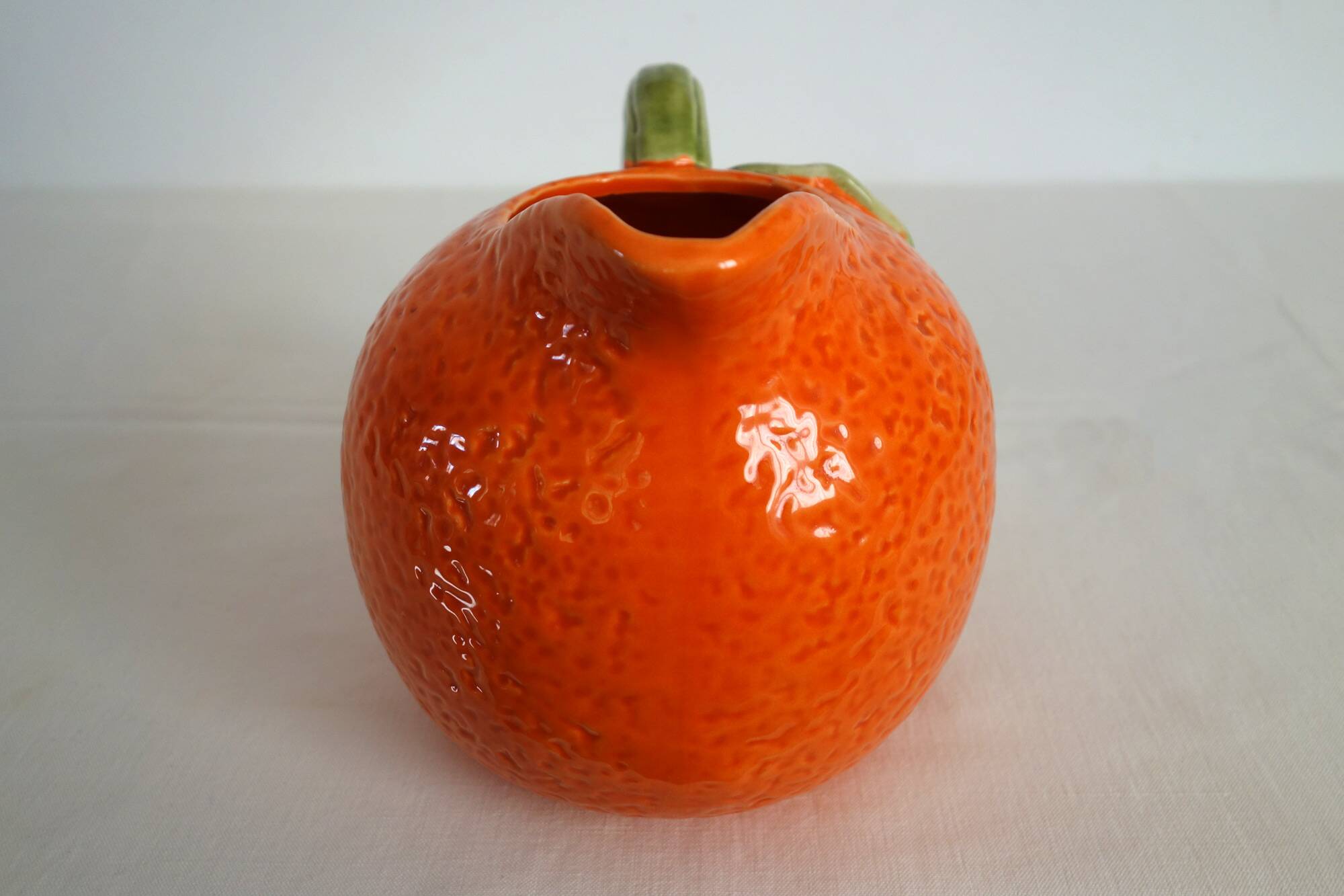Vintage orange slipware ceramic jug