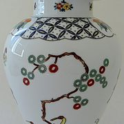 Baluster vase covered in porcelain by Coquet house in Limoges and decorated in Chantilly