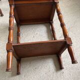 2 wooden nesting tables with molded legs