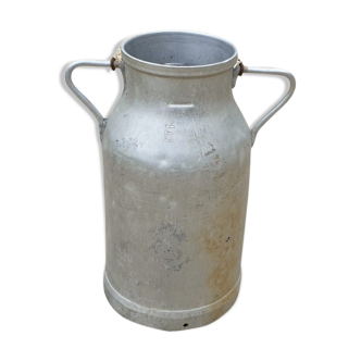 Umbrella-carrying milk can