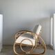 Large rattan rest chair and white cushions