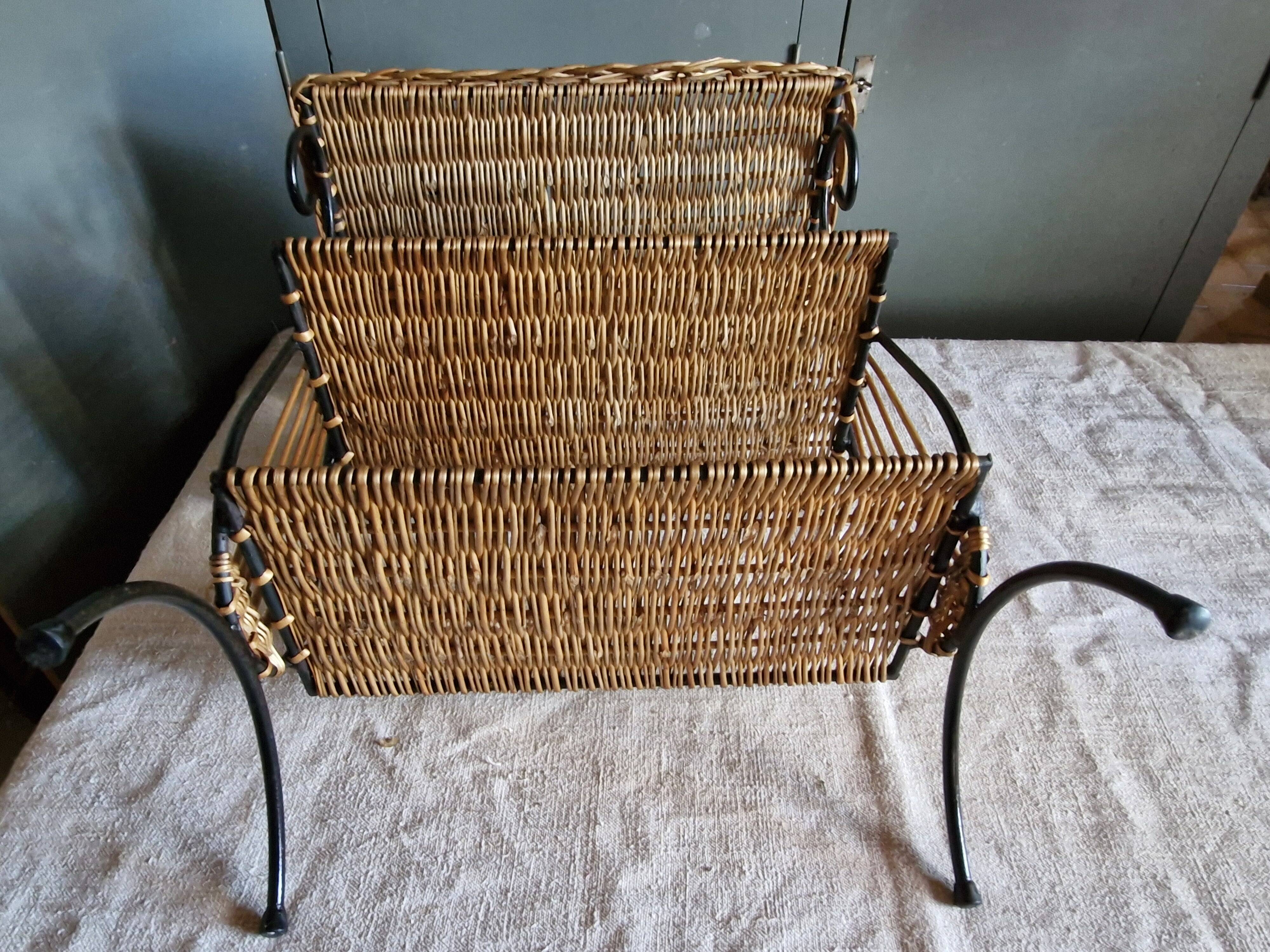 Small antique piece of furniture from the 1960s made of rattan and wrought iron in the shape of a lyre.