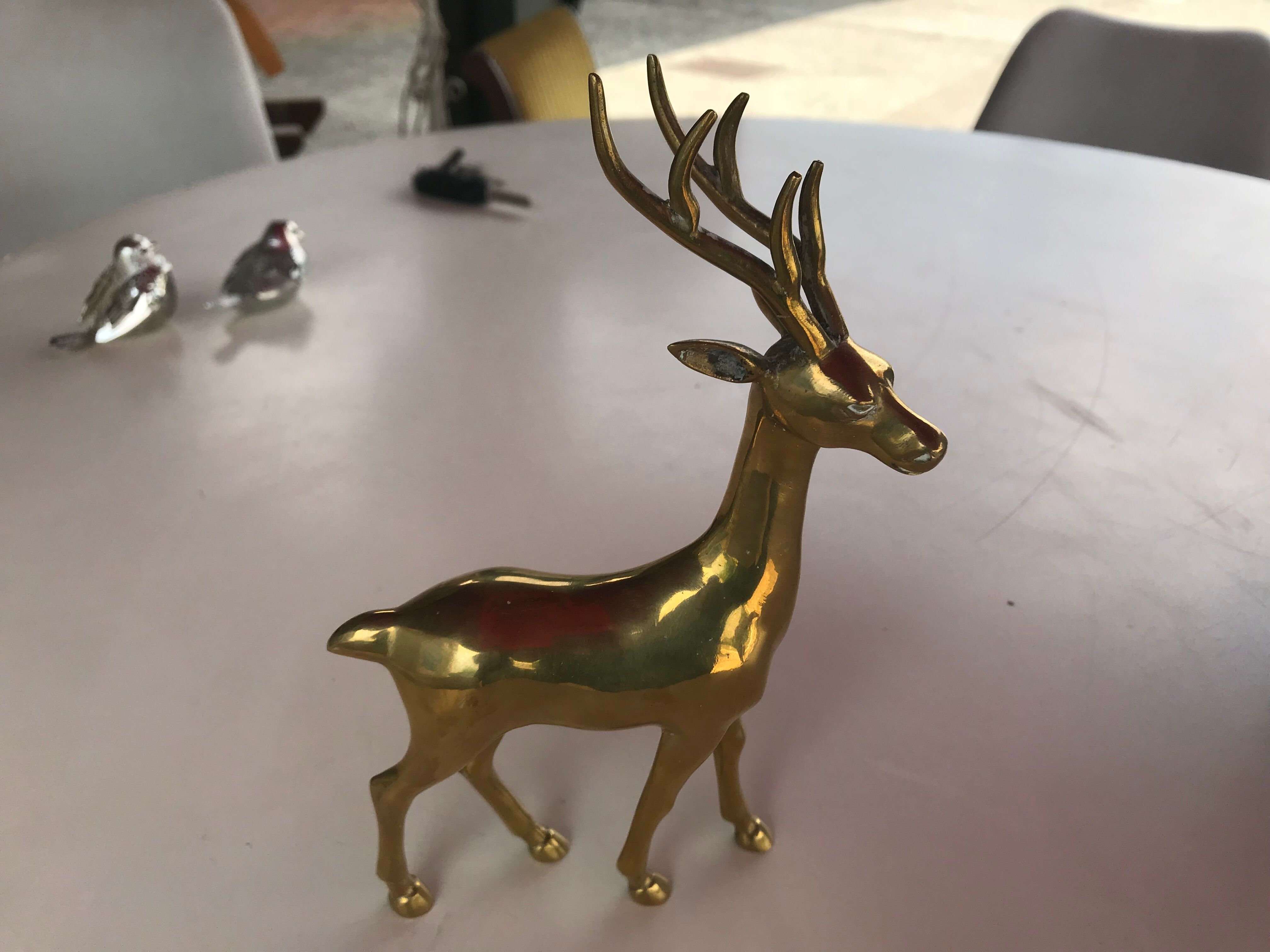 Deer statue in gilded bronze