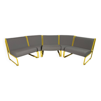Yellow tubular modular bench & gray fabric