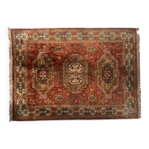 Tapis anciens en laine a décors sur fond rouge XX siècle