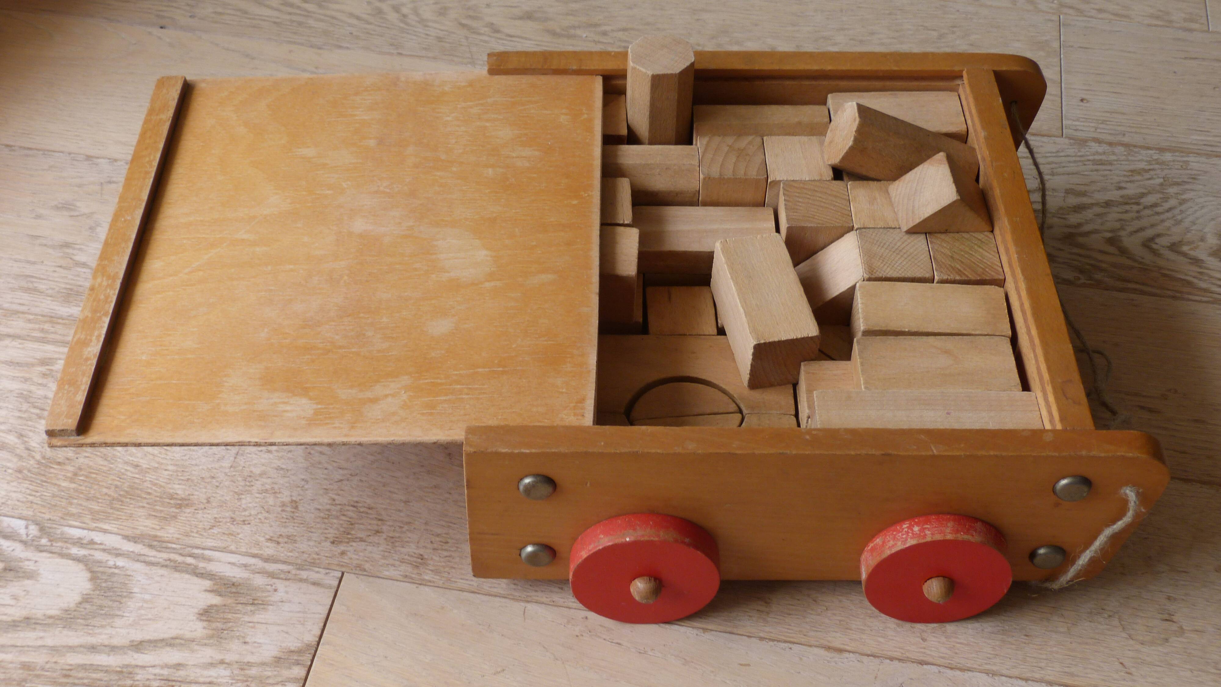 Old raw wood construction game in its cart