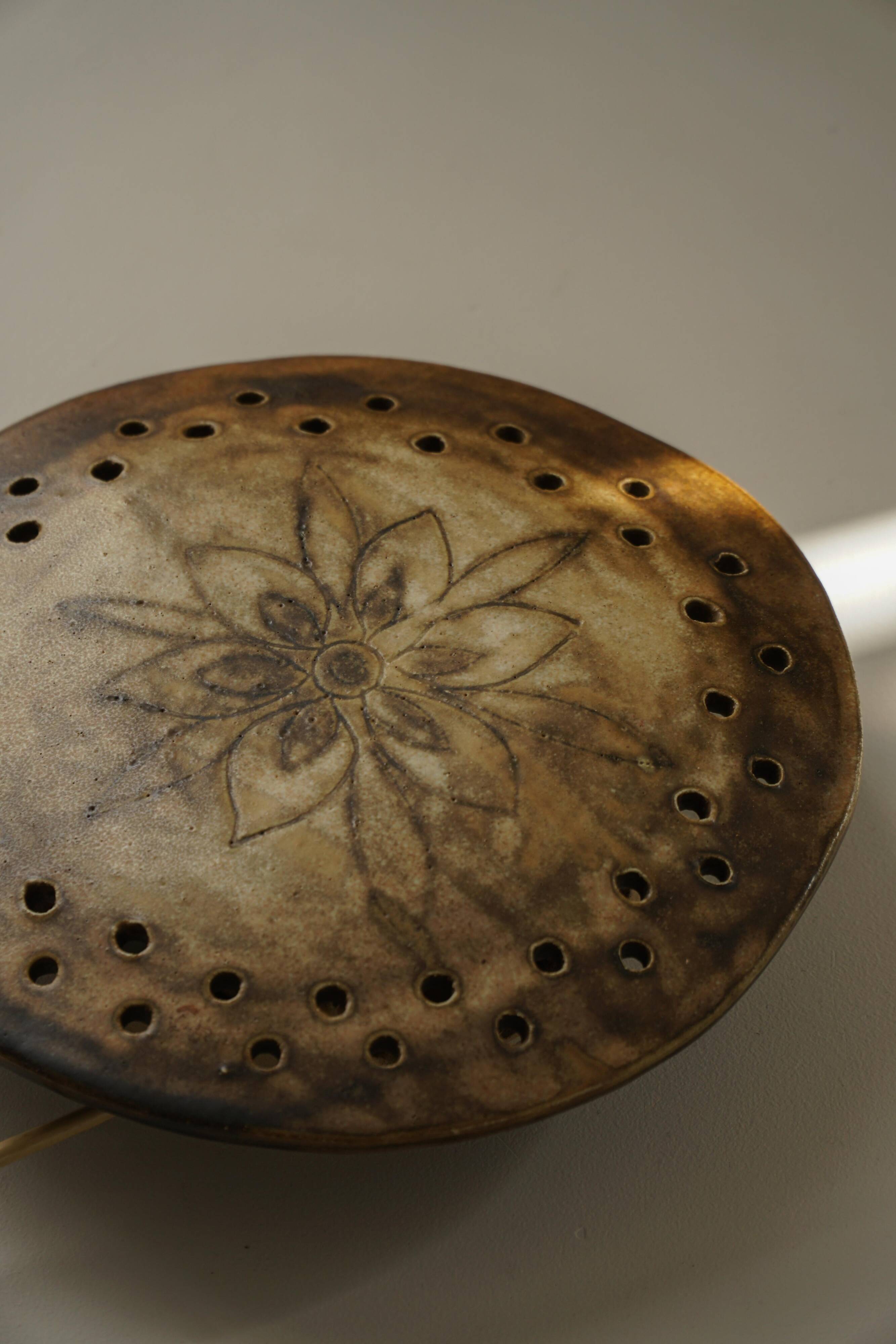 Mid-century sculptural wall light in organic Danish ceramic, 1970.