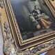 Framed reproduction painting with a golden frame.