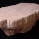 Designer coffee table with travertine rock effect — unique handcrafted piece.