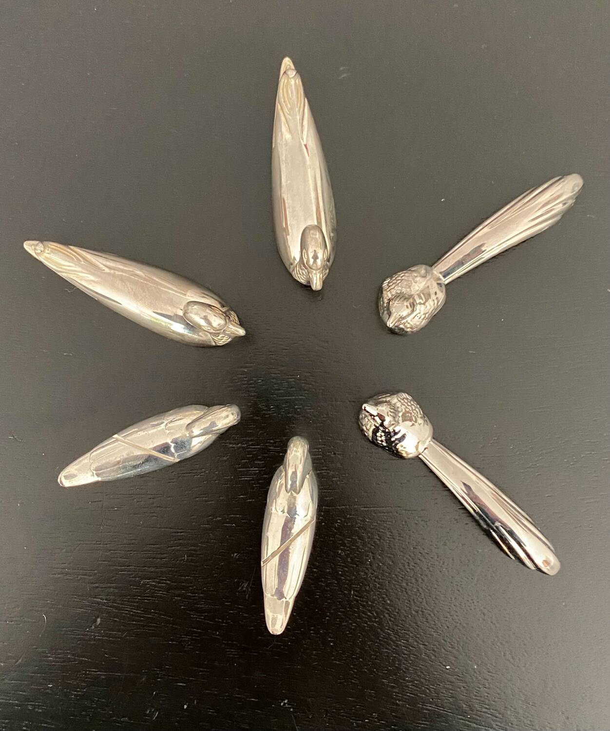 6 various animal shaped knife holders in silver metal