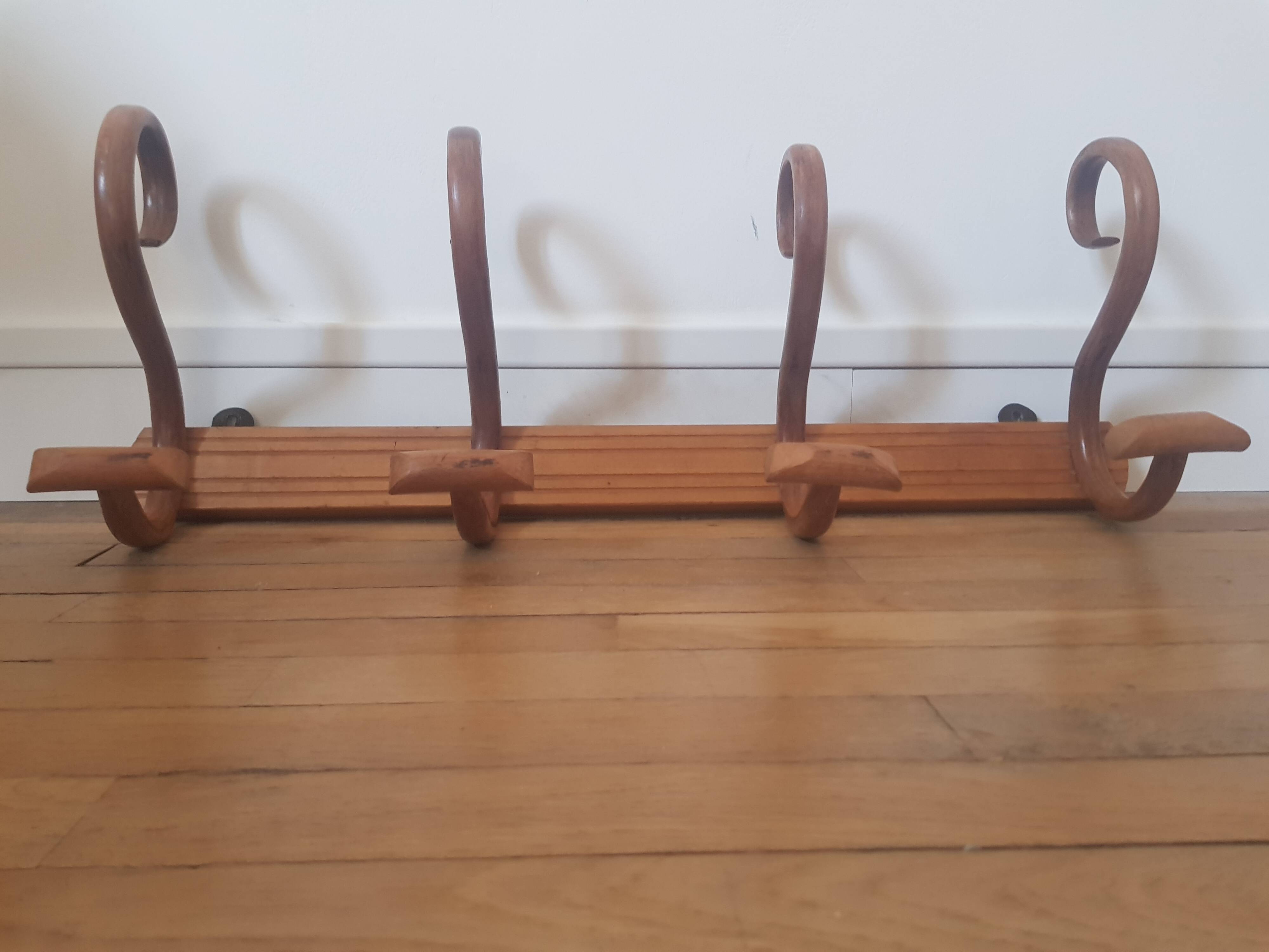 Wooden wall coat rack