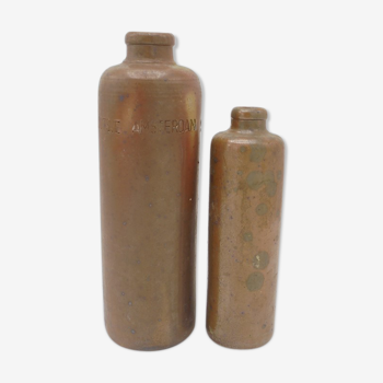 Duo of sandstone bottles