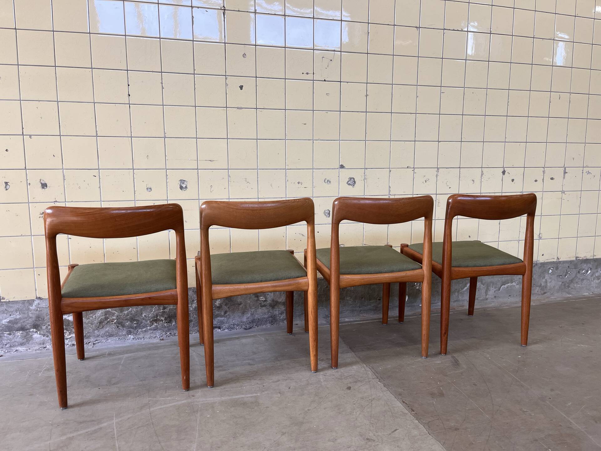 Set of four vintage solid teak dining chairs