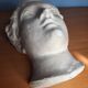 Antique plaster face of a woman