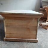 Base-shaped coffee table in light ash with a drawer and a compartment