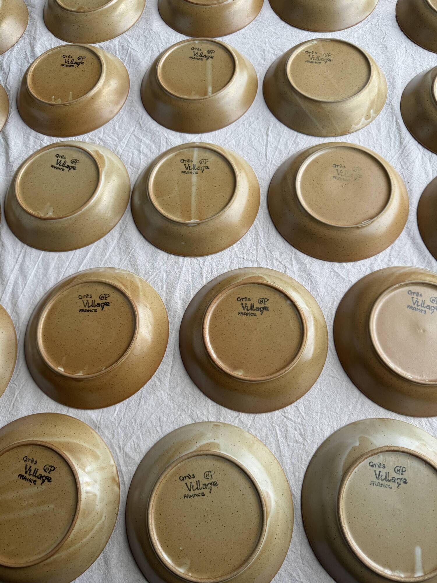 Set of 29 CNP village France D19 soup plates